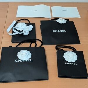 Chanel Black Bag Set with White Floral Detail